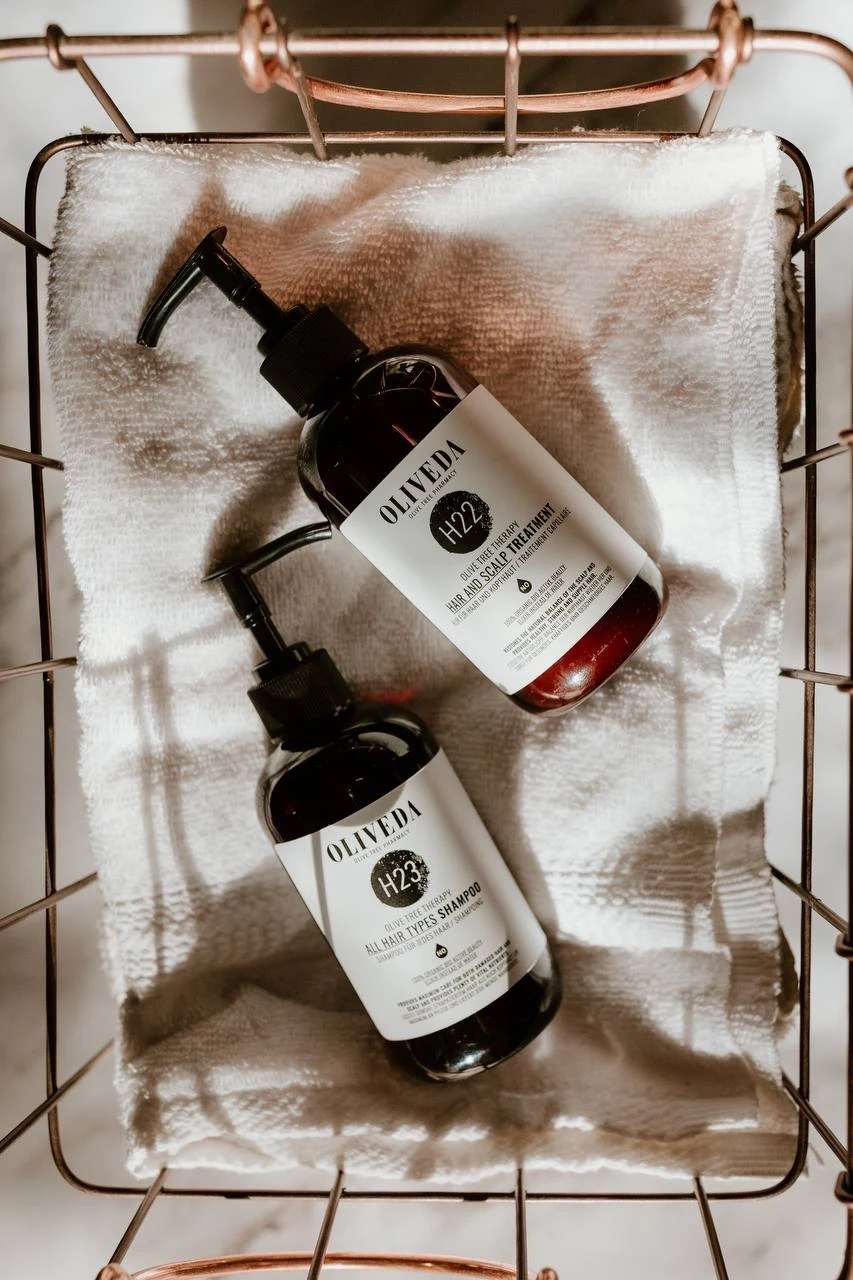Oliveda skincare product in warm editorial still life